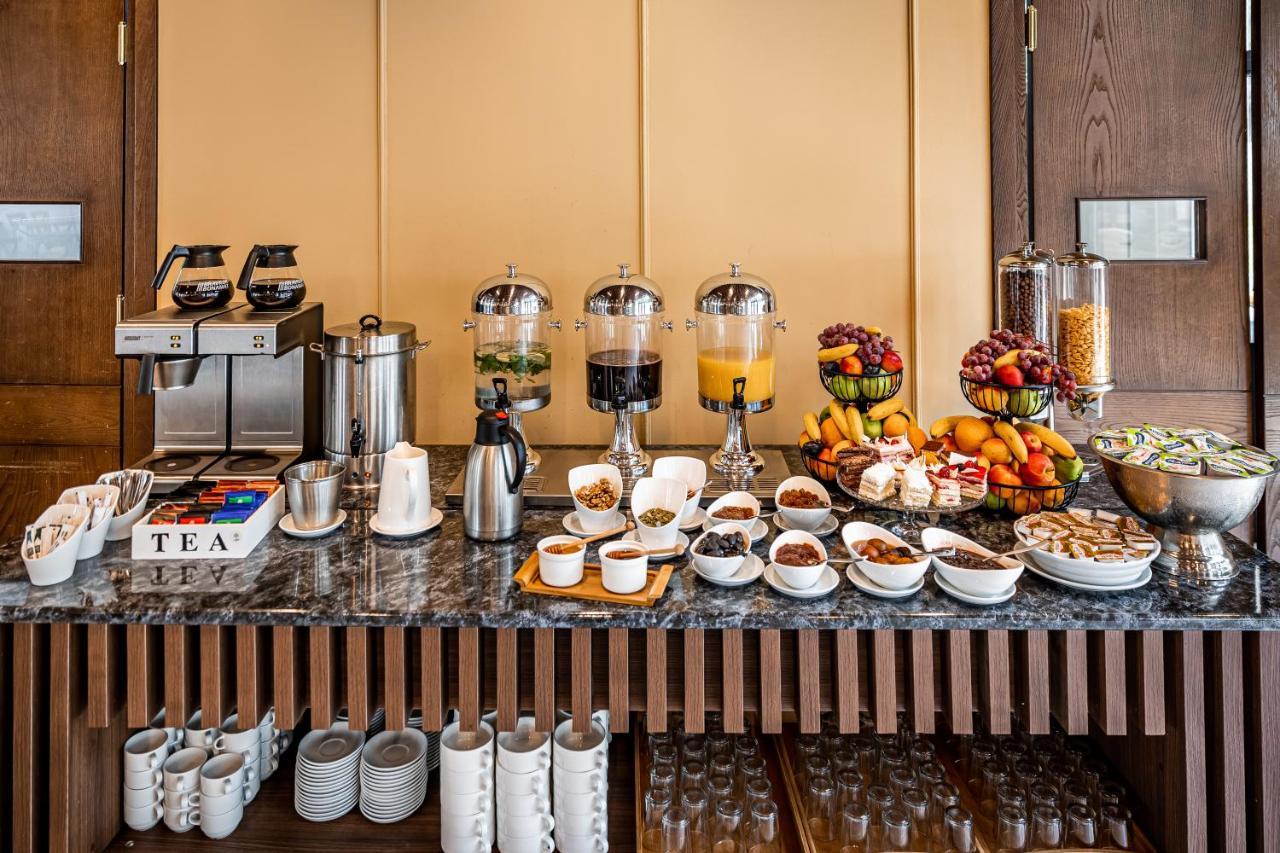 Kutaisi Inn Exterior photo A breakfast buffet